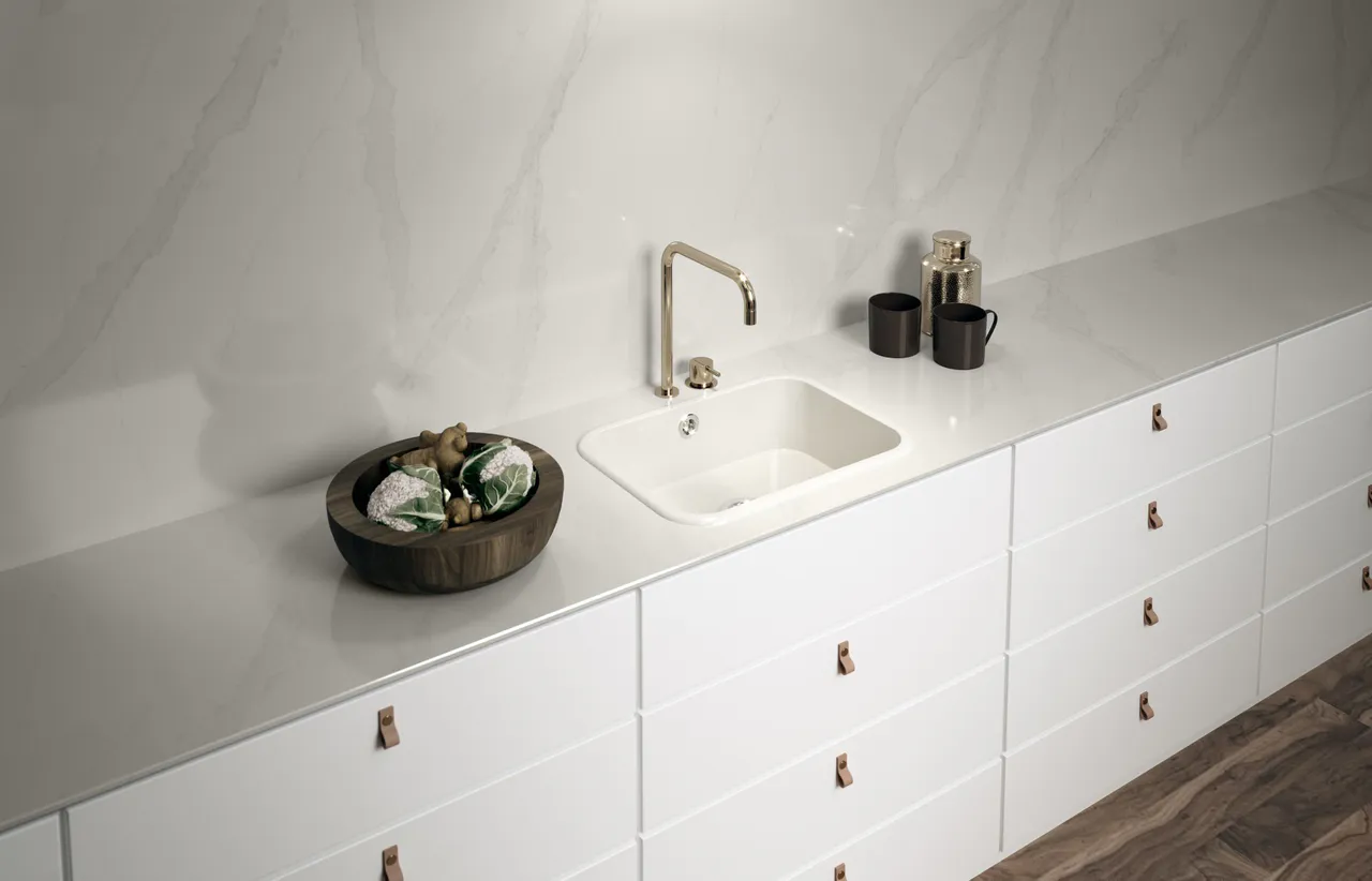 Exotic quartz installed as a bright vanity wall and counter